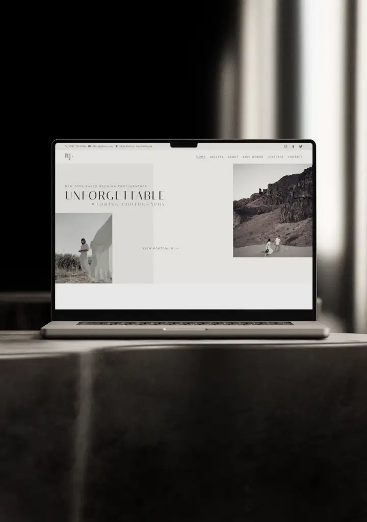 Laptop on desk with website mockup on screen